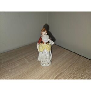 Vintage Made in Occupied Japan Colonial Lady Porcelain Figurine Red Yellow 4in